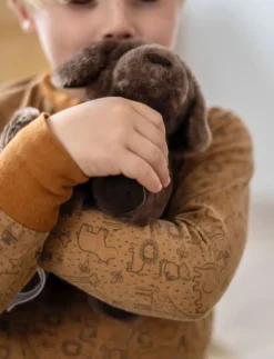 Hund mit Tasche und Pflege-Set