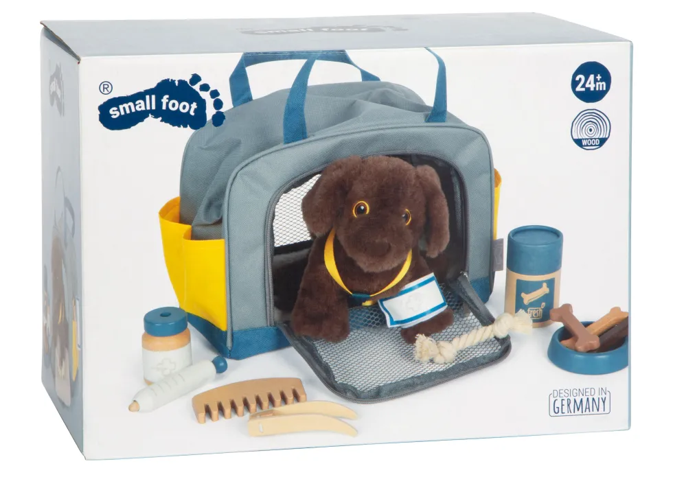 Hund mit Tasche und Pflege-Set