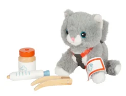 Katze mit Tasche und Pflege-Set